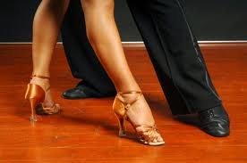 Picture of male and female dancers legs and shoes
